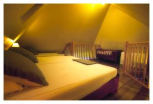 Postel nebo postele na pokoji v ubytování Dann Tan Lontan Ti Kaz Zépices Adults Only + 23 fotografií