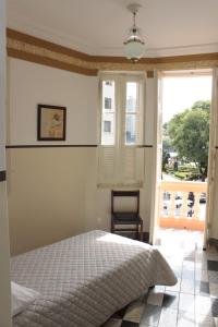 Cama ou camas em um quarto em Sul América Palace Hotel