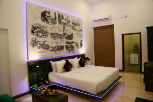 Cama o camas de una habitación en Tranquil Negombo Boutique