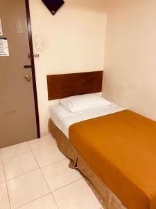 Postel nebo postele na pokoji v ubytování Coastal Park Hotel