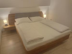 Postel nebo postele na pokoji v ubytování Penzion Réva