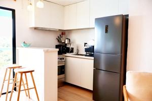 Kuchyň nebo kuchyňský kout v ubytování Blue Whale Villa - Deluxe + 37 fotografií