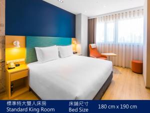 台中逢甲智选假日酒店客房内的一张或多张床位
