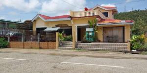 a house on the side of a street at Cody Homestay in Burgos