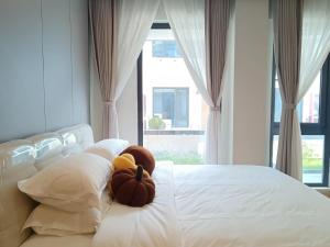 Katil atau katil-katil dalam bilik di 朱家角榆宿酒店 La Joie Resort