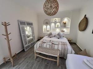 Postel nebo postele na pokoji v ubytování RIAD RIME QOUSSAI + 15 fotografií