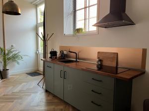 Kuchyň nebo kuchyňský kout v ubytování Logement de Pauw
