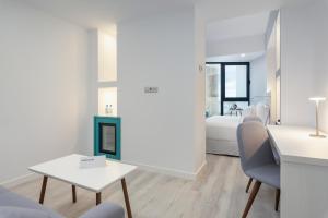 Postel nebo postele na pokoji v ubytování Occidental Las Palmas