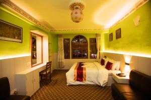 Postel nebo postele na pokoji v ubytování Hotel Pomelo House Inn