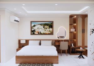 Postel nebo postele na pokoji v ubytování Boutique En Hotel Sapa