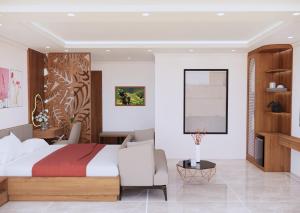 Postel nebo postele na pokoji v ubytování Boutique En Hotel Sapa