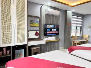 Postel nebo postele na pokoji v ubytování Boutique En Hotel Sapa