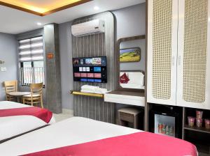 Postel nebo postele na pokoji v ubytování Boutique En Hotel Sapa