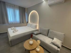 Ένα ή περισσότερα κρεβάτια σε δωμάτιο στο Ladadika Urban Suites