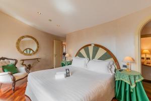 Postel nebo postele na pokoji v ubytování B&B Hotel Firenze Pitti Palace al Ponte Vecchio