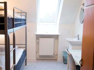 Voodi või voodid majutusasutuse Aarhus Hostel og Hotel toas