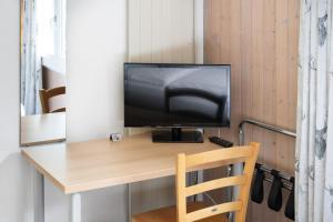 TV o dispositivi per l'intrattenimento presso Jungfrau Lodge, Swiss Mountain Hotel