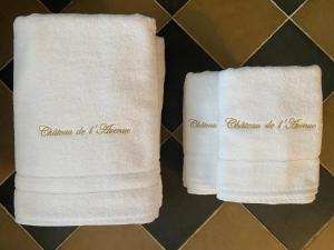 two white towels with the words bathroom do it yourself on them at La Maison du Gardien, Chateau de lAvenue in Pierrefitte-en-Auge +62 photos