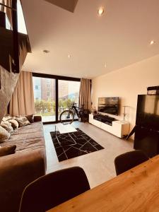 Postel nebo postele na pokoji v ubytování T1 Loft I modern I zentral I Terrasse I Design I