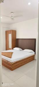 Postel nebo postele na pokoji v ubytování Sgr Luxury Homes