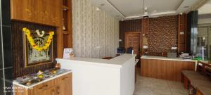 a room with a counter and aasteryasteryasteryasteryasteryasteryasteryasteryastery at SGR Luxury Homes in Kammasandra