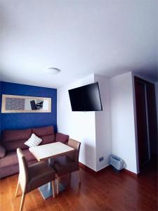 TV a/nebo společenská místnost v ubytování Hotel Herreros