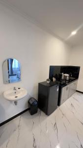 Μια τηλεόραση ή/και κέντρο ψυχαγωγίας στο Abram Homestay - For Family and Friends