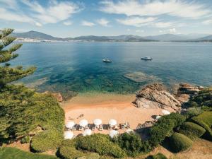an aerial view of a beach with a group of domes at Sofitel Golfe d'Ajaccio Thalassa Sea & Spa in Ajaccio