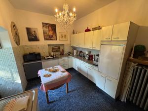 Küche/Küchenzeile in der Unterkunft Gästehaus auf der Salzburg