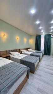 Ένα ή περισσότερα κρεβάτια σε δωμάτιο στο SAFO GUEST House 2 +4 φωτογραφίες