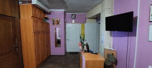 TV a/nebo společenská místnost v ubytování Eva Hostel