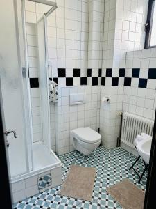 Koupelna v ubytování Haus am Eck + 26 fotografií