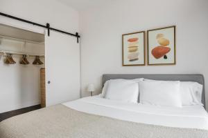 Ένα ή περισσότερα κρεβάτια σε δωμάτιο στο Blueground Pasadena gym elev near bars LAX-1231