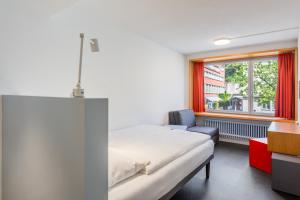Letto o letti in una camera di Hotel Marta