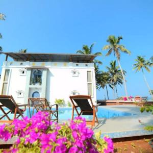 A garden outside Magnolia Guesthouse Varkala