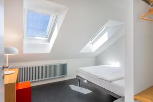 Letto o letti in una camera di Hotel Marta