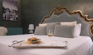 Voodi või voodid majutusasutuse Risorgimento Resort toas