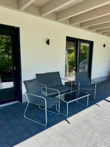 Posezení v ubytování Wohnung am Wald