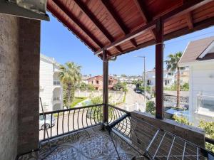a balcony with a view of a street at Homekemer A in Kemer