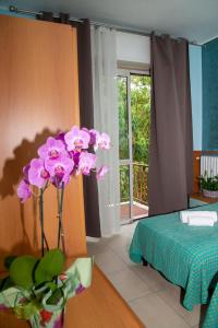 Postel nebo postele na pokoji v ubytování Hotel Victoria