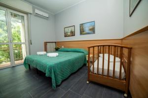 Postel nebo postele na pokoji v ubytování Hotel Victoria