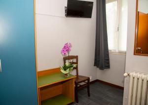 TV a/nebo společenská místnost v ubytování Hotel Victoria