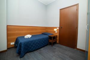 Postel nebo postele na pokoji v ubytování Hotel Victoria