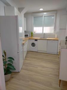 Η κουζίνα ή μικρή κουζίνα στο Apartamento Lola Home