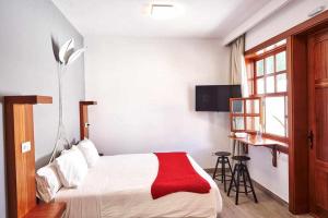 Posteľ alebo postele v izbe v ubytovaní Delmás Hotel Emblemático + 37 fotografií