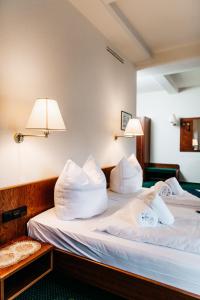 Postel nebo postele na pokoji v ubytování Hotel Brander Hof
