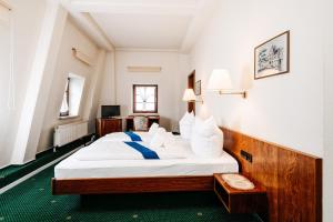 Postel nebo postele na pokoji v ubytování Hotel Brander Hof