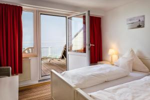Postel nebo postele na pokoji v ubytování Hotel Felsen-Eck
