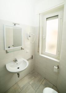 Koupelna v ubytování Hotel Victoria
