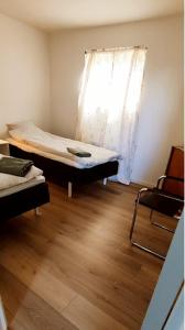Voodi või voodid majutusasutuse Sleepindenmark toas